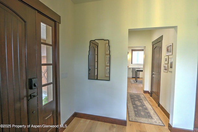 86 Sunrise Ct, Glenwood Springs, CO 81601 - foyer entrance featuring light wood finished floors and baseboards
