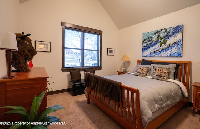 498 Red Cliff Cir, Glenwood Springs, CO 81601 - carpeted bedroom featuring baseboards and vaulted ceiling