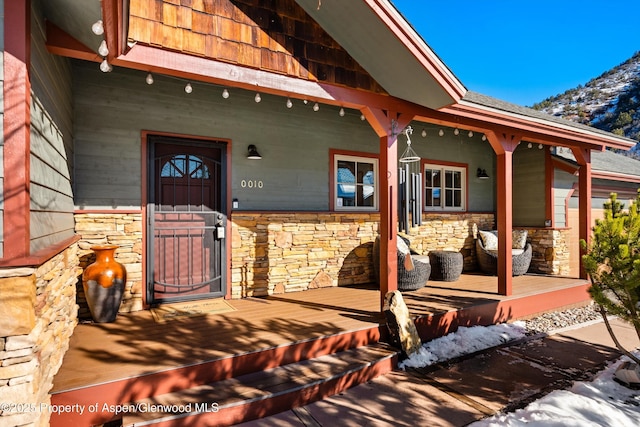 entrance to property with covered porch