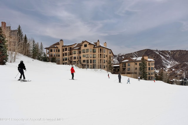 surrounding community with a mountain view