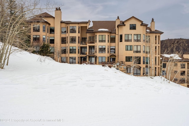 view of snow covered building