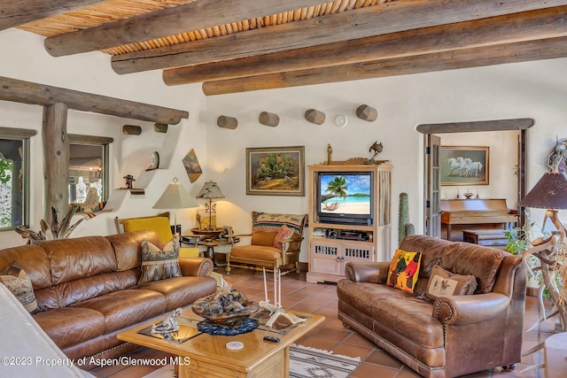 tiled living room featuring beamed ceiling and wood ceiling