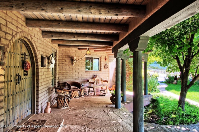 view of patio featuring covered porch