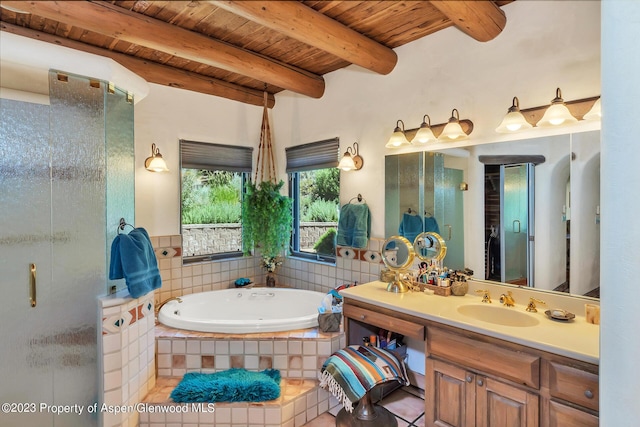 bathroom with vanity, wooden ceiling, tile patterned floors, shower with separate bathtub, and beamed ceiling