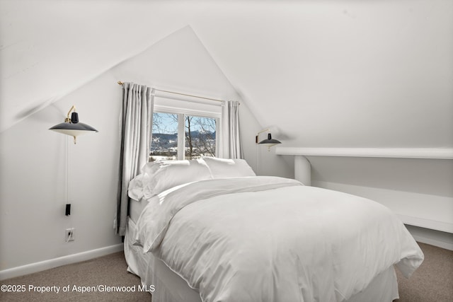 260 Star Mesa Rd, Aspen, CO 81611 - carpeted bedroom with vaulted ceiling and baseboards