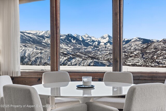 260 Star Mesa Rd, Aspen, CO 81611 - dining room with a mountain view and healthy amount of natural light