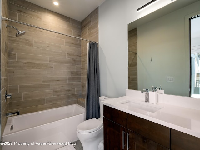 full bathroom with toilet, vanity, and shower / bathtub combination with curtain