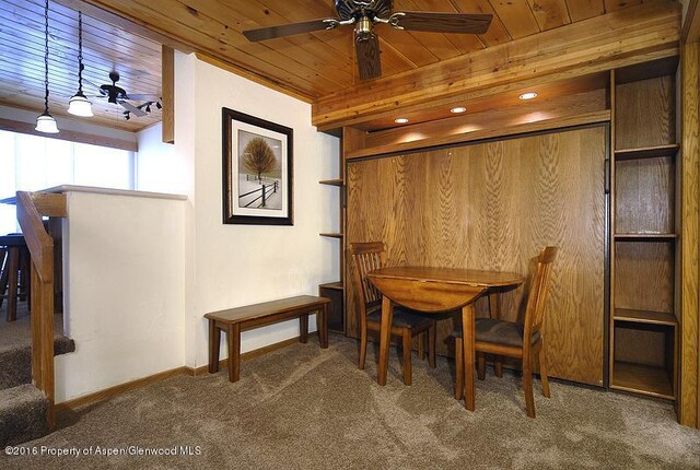 301 E Hyman Avenue #305 (Wks 13,14,49), Aspen, CO 81611 - dining space featuring carpet flooring, ceiling fan, and wood ceiling
