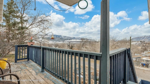 balcony featuring a mountain view