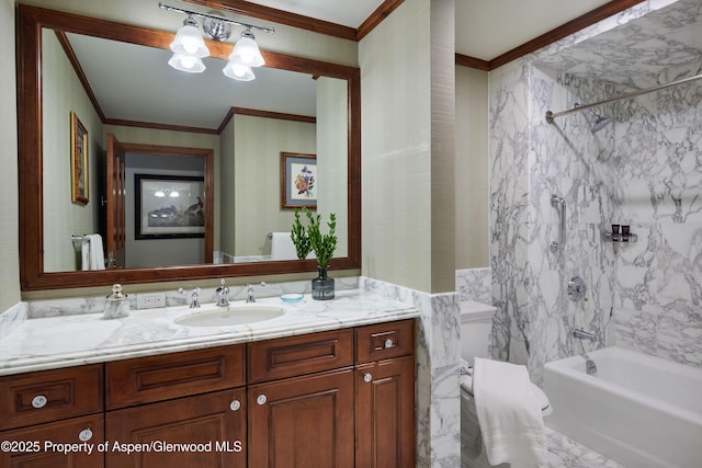 bathroom featuring vanity, ornamental molding, and tiled shower / bath