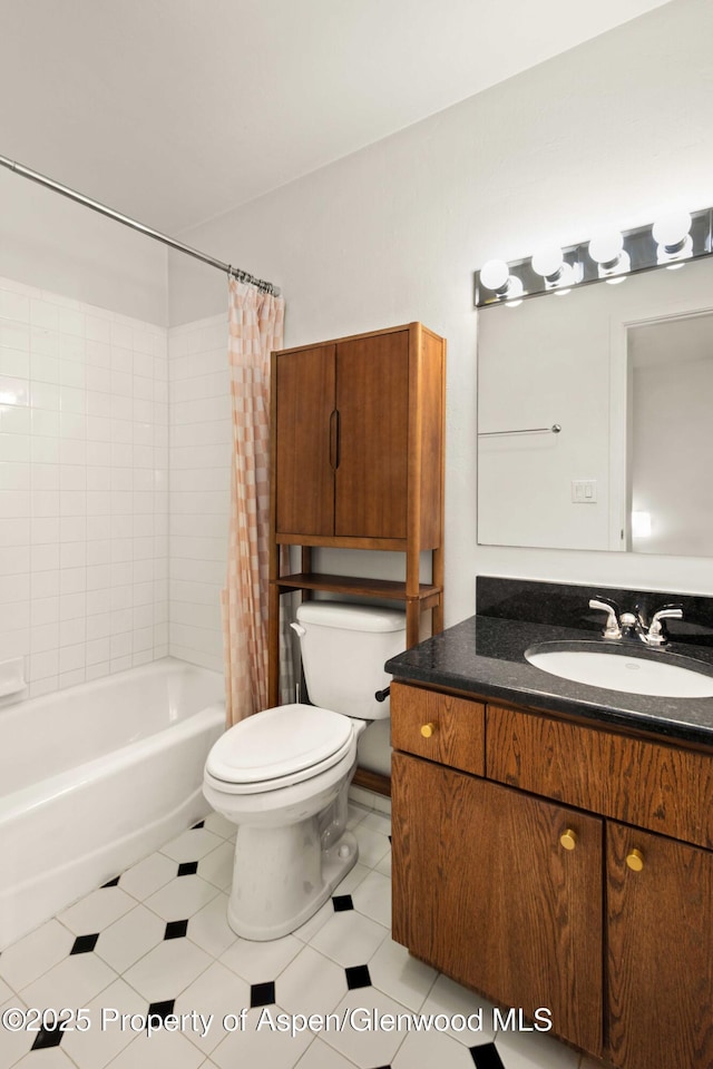 full bathroom featuring vanity, toilet, and shower / tub combo with curtain