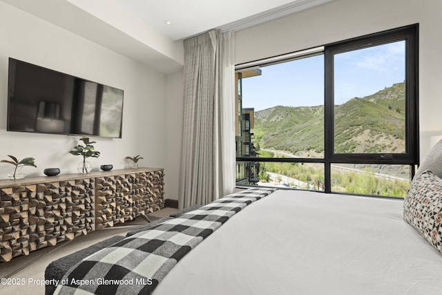 77 Wood Rd Unit 505E, Snowmass Village, CO 81615 - bedroom featuring carpet and a mountain view