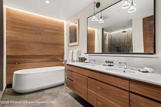 77 Wood Rd Unit 505E, Snowmass Village, CO 81615 - full bath featuring a freestanding bath, double vanity, and a walk in shower
