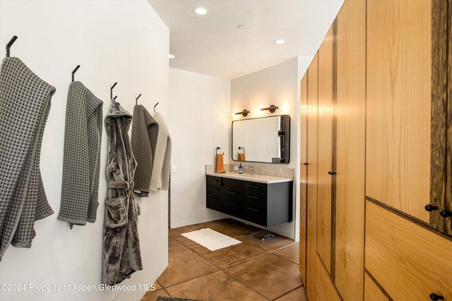 bathroom featuring tile patterned floors and vanity