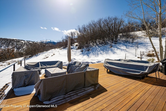 view of snow covered deck