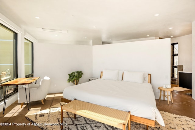 bedroom with tile patterned floors