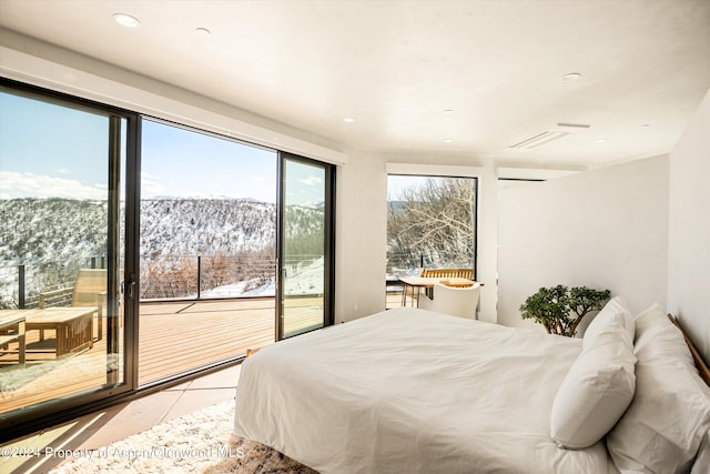 tiled bedroom with access to outside