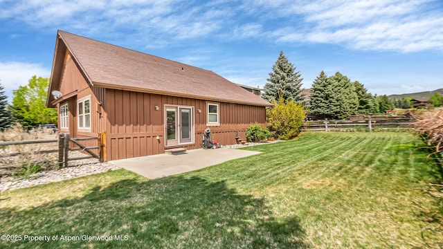 168 Blackhawk Dr, New Castle, CO 81647 - back of house featuring a patio area, a shingled roof, and entry steps
