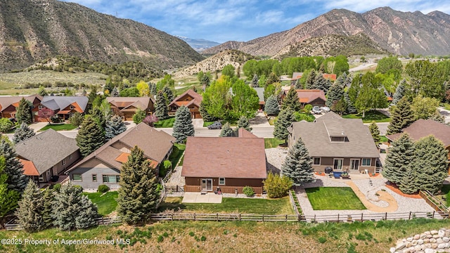 168 Blackhawk Dr, New Castle, CO 81647 - aerial view of residential area featuring a mountain backdrop