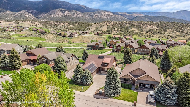168 Blackhawk Dr, New Castle, CO 81647 - aerial perspective of suburban area with mountains