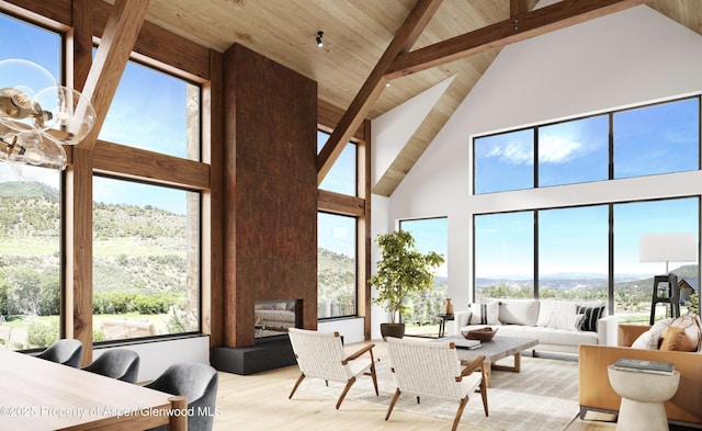 902/904 Sopris Creek Rd, Basalt, CO 81621 - living area with high vaulted ceiling, wood finished floors, a mountain view, a wood ceiling with exposed beams, and a multi sided fireplace