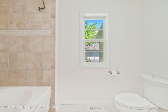 1020 Alta Vista Dr, Craig, CO 81625 - full bath with toilet and marble look tiles