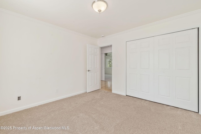 1020 Alta Vista Dr, Craig, CO 81625 - unfurnished bedroom featuring ornamental molding, carpet floors, and a closet