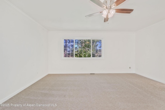 1020 Alta Vista Dr, Craig, CO 81625 - carpeted spare room with ornamental molding and ceiling fan