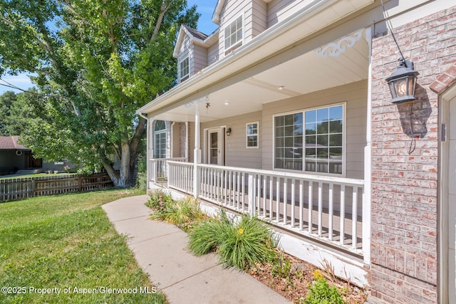 1020 Alta Vista Dr, Craig, CO 81625 - doorway to property with a porch and brick siding