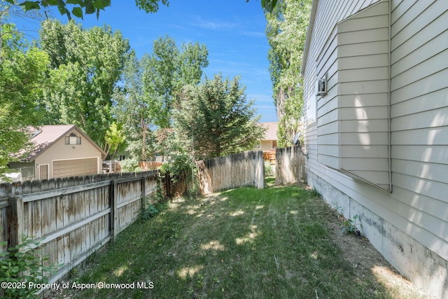 1020 Alta Vista Dr, Craig, CO 81625 - fenced backyard featuring a detached garage