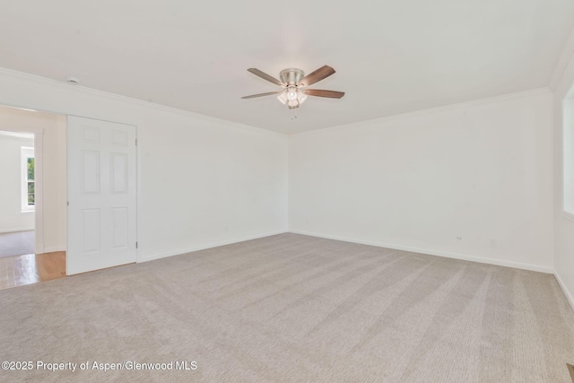 1020 Alta Vista Dr, Craig, CO 81625 - unfurnished room featuring light colored carpet, a ceiling fan, and crown molding