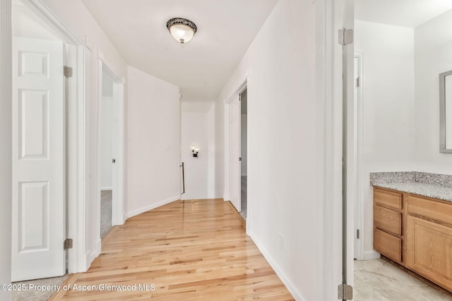 1020 Alta Vista Dr, Craig, CO 81625 - hallway featuring light wood-style floors and baseboards