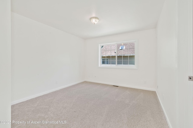 1020 Alta Vista Dr, Craig, CO 81625 - spare room with light colored carpet