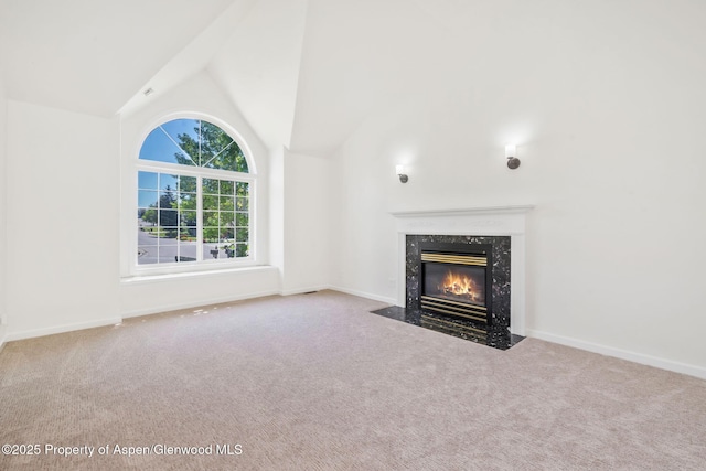1020 Alta Vista Dr, Craig, CO 81625 - unfurnished living room featuring carpet flooring, a fireplace, and lofted ceiling