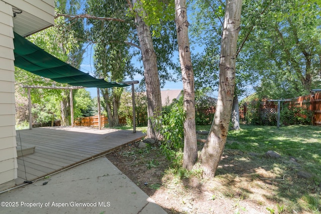 1020 Alta Vista Dr, Craig, CO 81625 - fenced backyard with a wooden deck