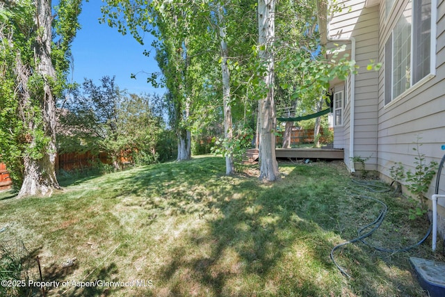 1020 Alta Vista Dr, Craig, CO 81625 - view of grassy yard featuring a deck