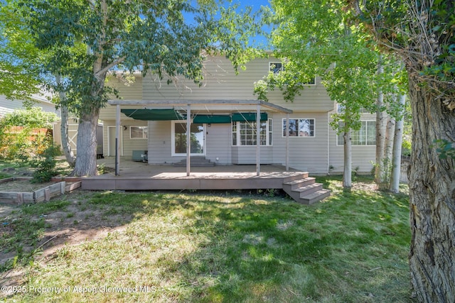 1020 Alta Vista Dr, Craig, CO 81625 - rear view of property with a yard and a wooden deck