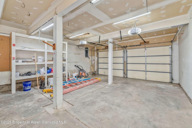 1020 Alta Vista Dr, Craig, CO 81625 - garage featuring a garage door opener and electric panel