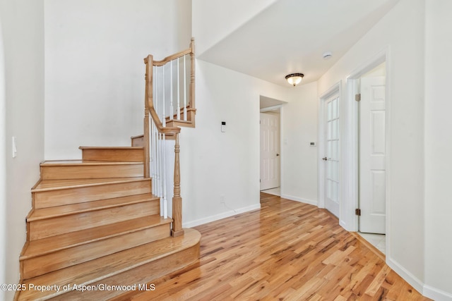 1020 Alta Vista Dr, Craig, CO 81625 - stairs with wood finished floors