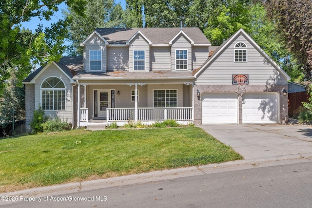 1020 Alta Vista Dr, Craig, CO 81625 - traditional-style home featuring a porch, concrete driveway, an attached garage, and a front yard