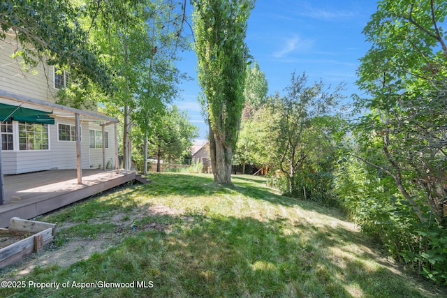1020 Alta Vista Dr, Craig, CO 81625 - view of green lawn featuring a deck