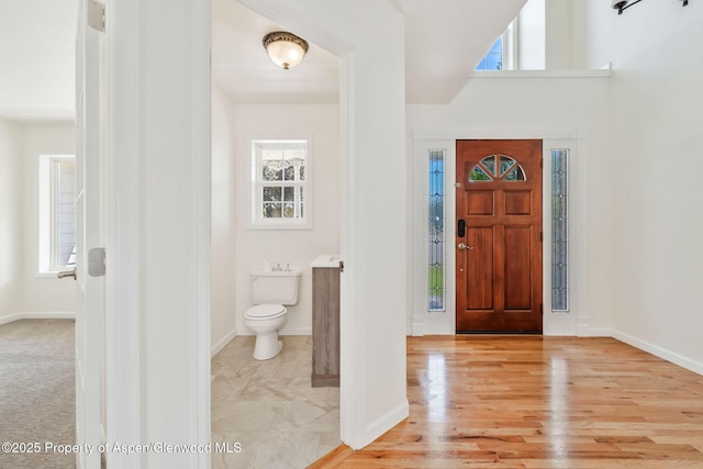 1020 Alta Vista Dr, Craig, CO 81625 - foyer entrance with baseboards and light wood finished floors