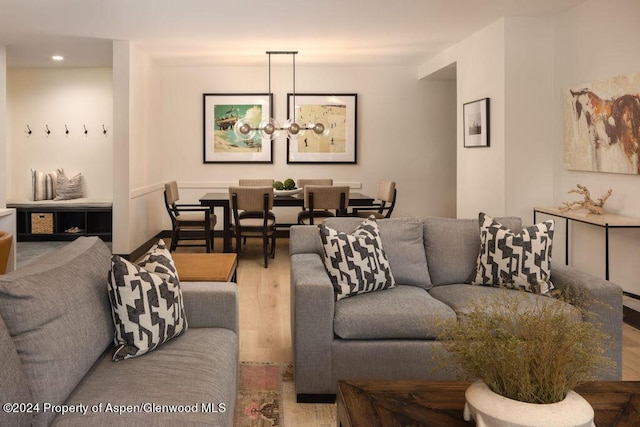 living room with recessed lighting and wood finished floors
