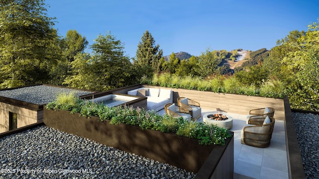 433 Gillespie St, Aspen, CO 81611 - view of patio with an outdoor living space with a fire pit