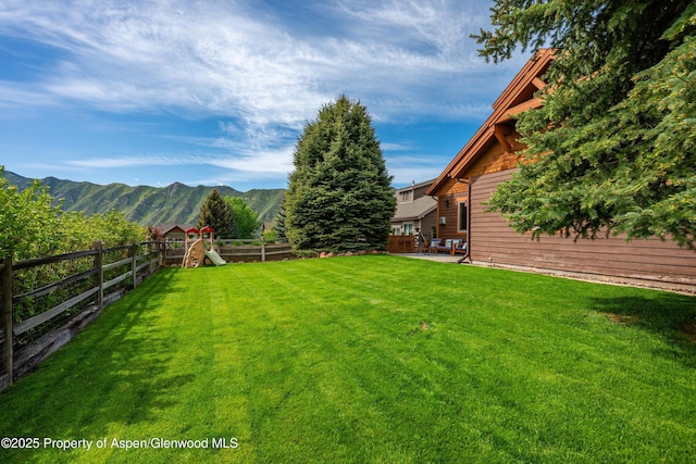 152 Blackhawk Dr, New Castle, CO 81647 - view of yard with a playground, a patio, and a mountain view
