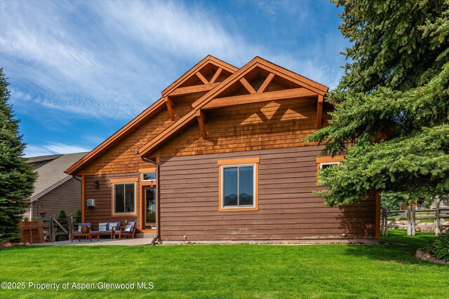 152 Blackhawk Dr, New Castle, CO 81647 - rear view of property with an outdoor hangout area and a patio