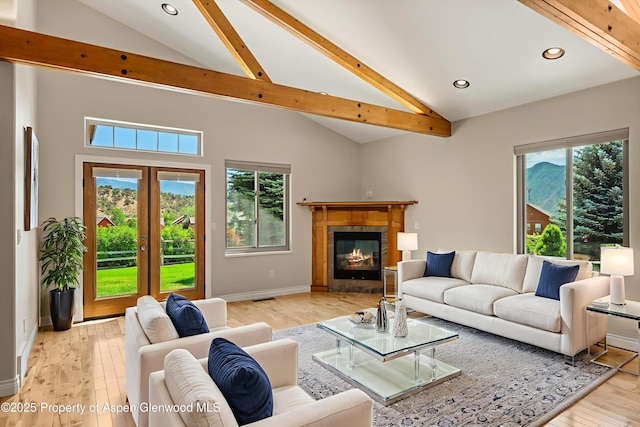 152 Blackhawk Dr, New Castle, CO 81647 - living room with plenty of natural light, recessed lighting, beam ceiling, wood finished floors, and high vaulted ceiling