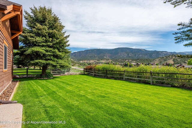 152 Blackhawk Dr, New Castle, CO 81647 - fenced backyard with a mountain view