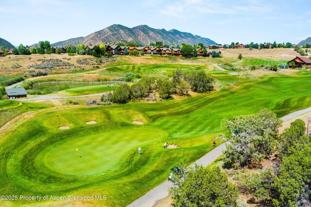 152 Blackhawk Dr, New Castle, CO 81647 - mountain view featuring a local golf course and nearby suburban area