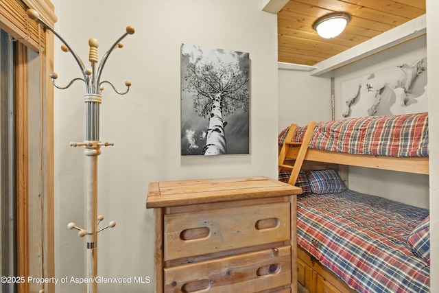 bedroom featuring wood ceiling